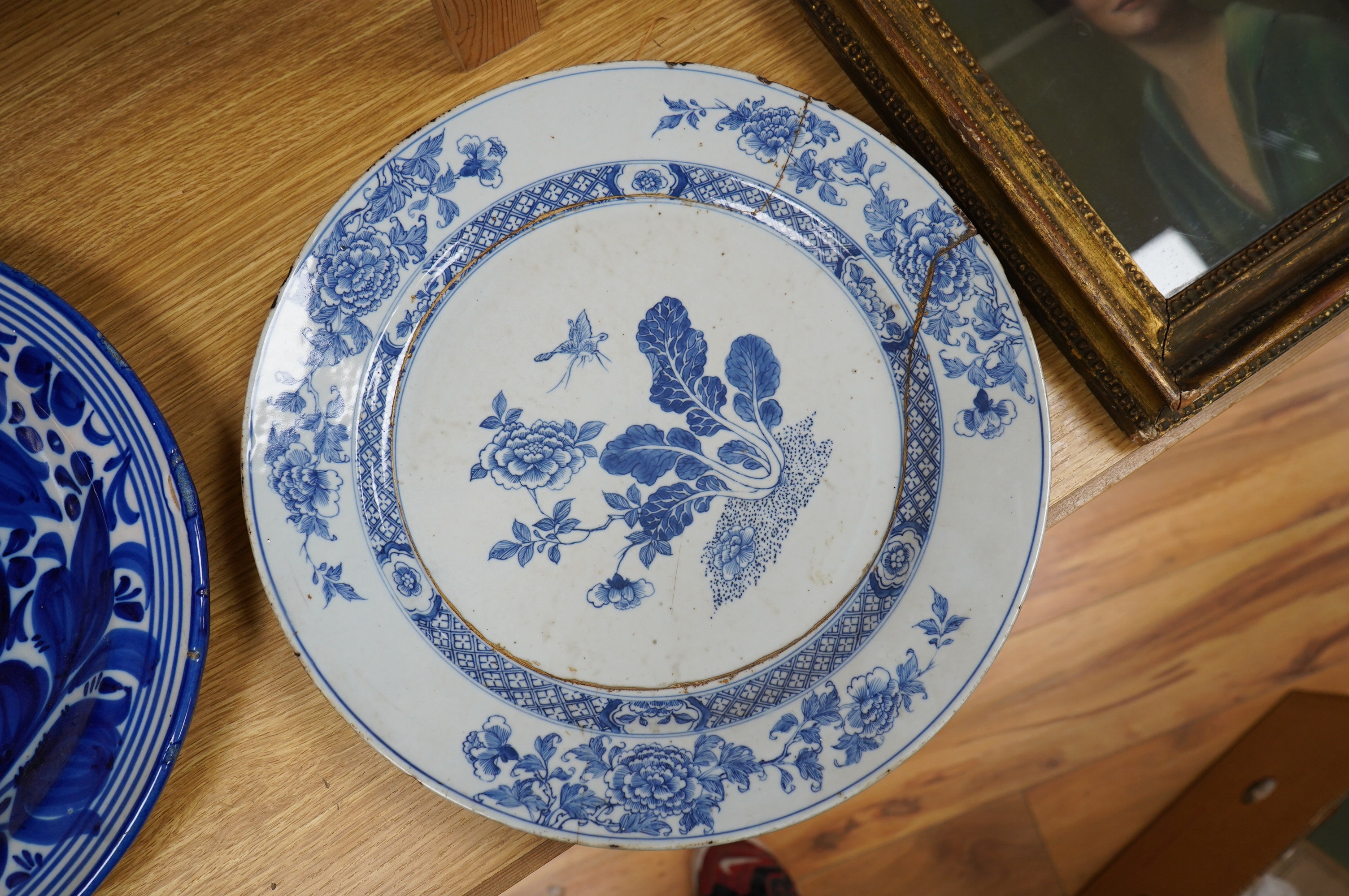 A 18th century delftware charger, another later, a Victorian Briar Rose earthenware dish and a Chinese dish, largest 35cm Condition - poor